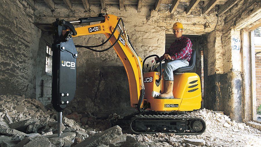 JCB Excavator Micro at work in a shed