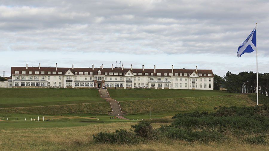 Trump's Turnberry Hotel with a Saltire flag in the foreground
