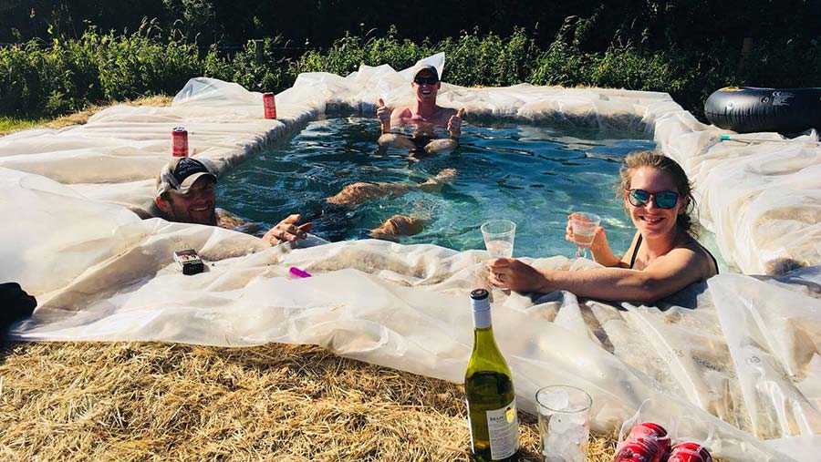 Farmers in swimming pool