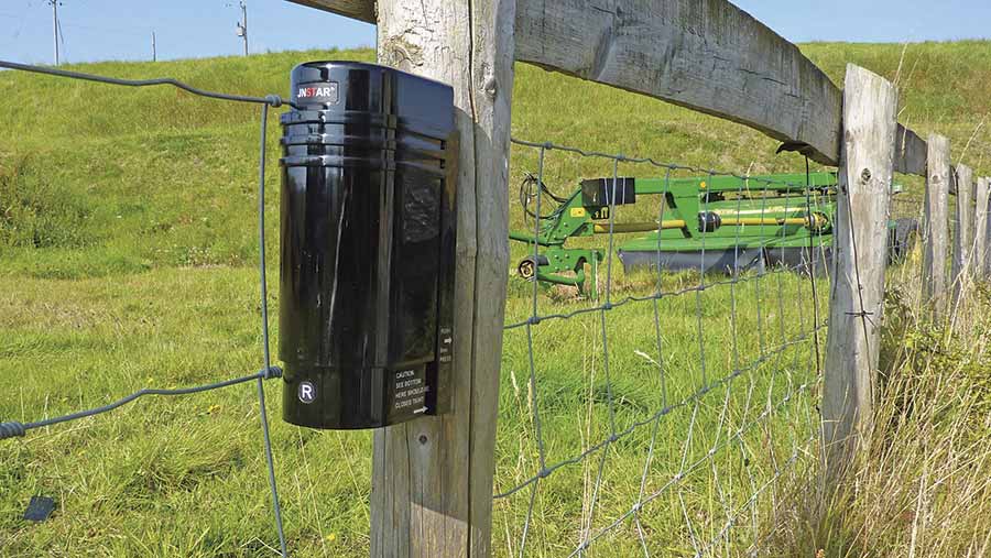 An Alarms for Farms unit on a post