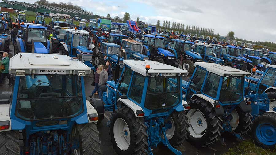 Rows of Ford tractors