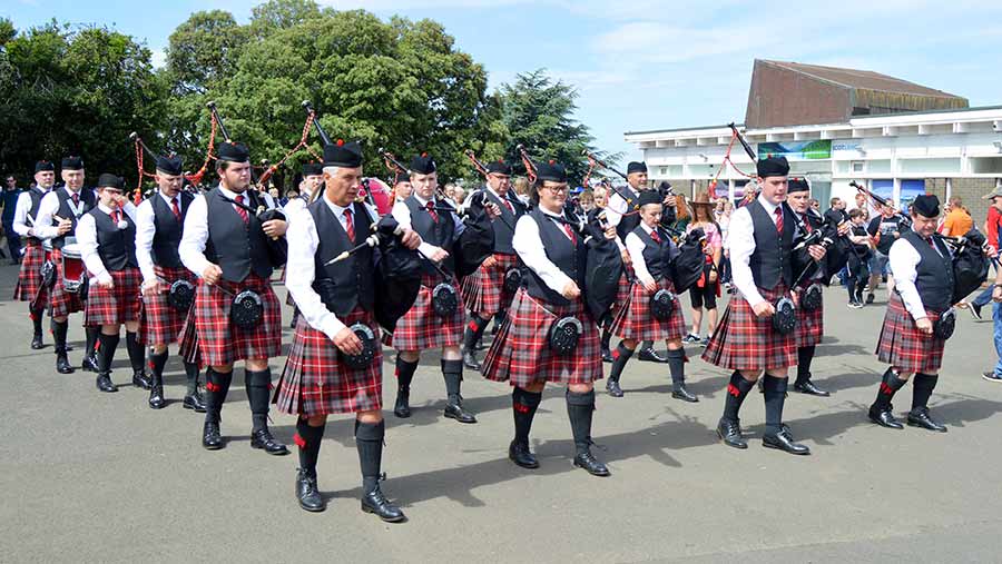 Bagpipers marching at the show