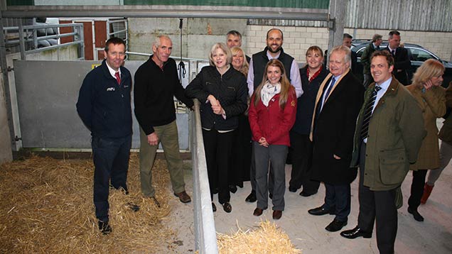 Theresa May with farmers from the farmer-led crime initiative.