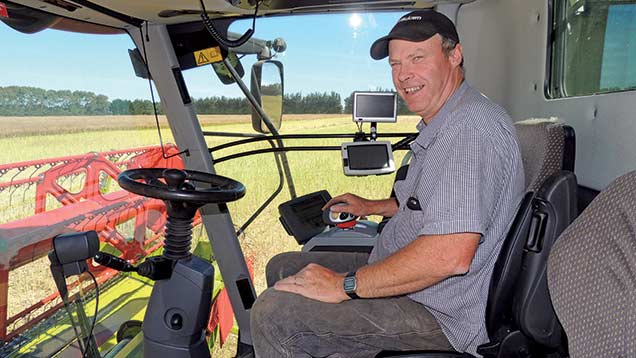 Chris Dennison in his tractor cab