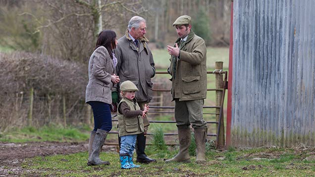 Sam and Emily Stables, new tenants at Kings Pitt Farm, Herefordshire, explain their plans to the Duke of Cornwall.