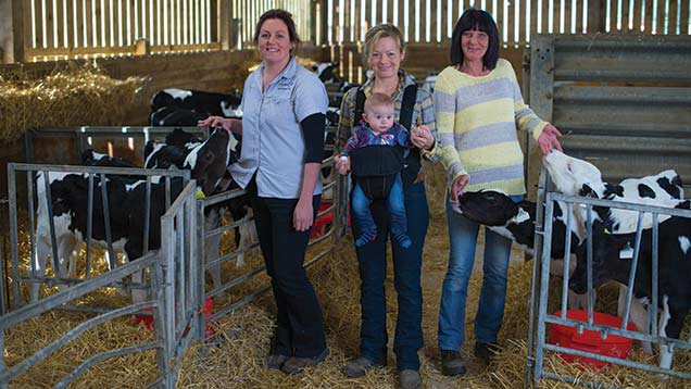 Emma Martin (centre) with vet Sarah Caldwell (left) and calf-rearer Jane Hick. ©Jim Wileman