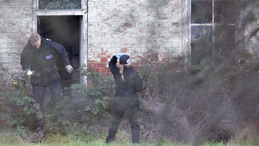 Police search Tony Martin's property after he is arrested on suspicion of firearms offences. © Terry Harris/REX Shutterstock