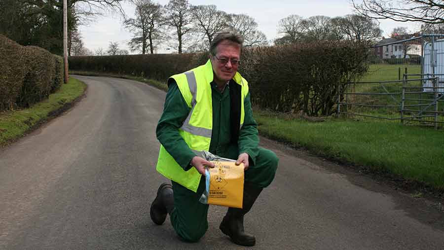 Bill Mellor with roadkill bags