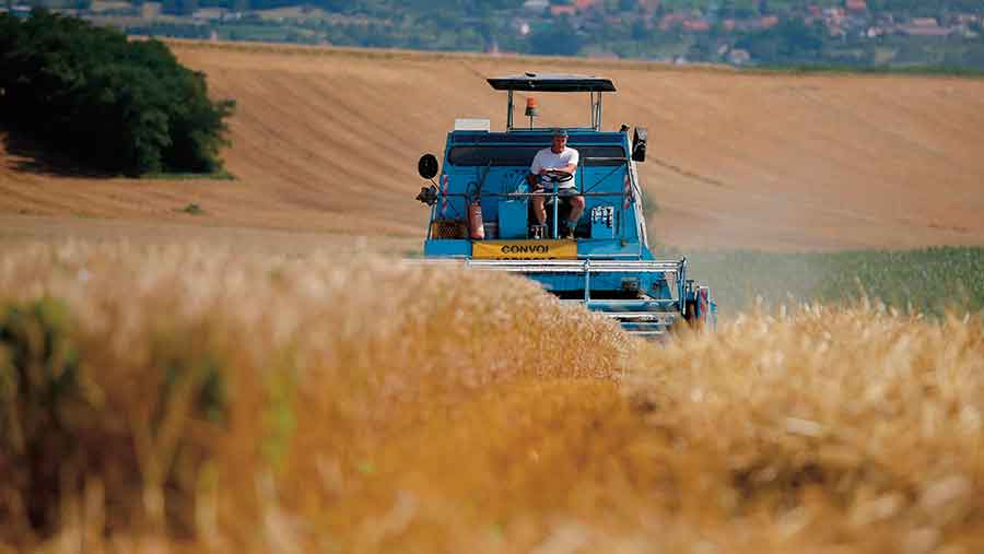 Harvesting wheat in France © Vincent Kessler/Reuters/Alamy