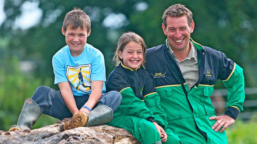 Farmer Gary Yeomans with his children Megan and Tommy © Richard Stanton