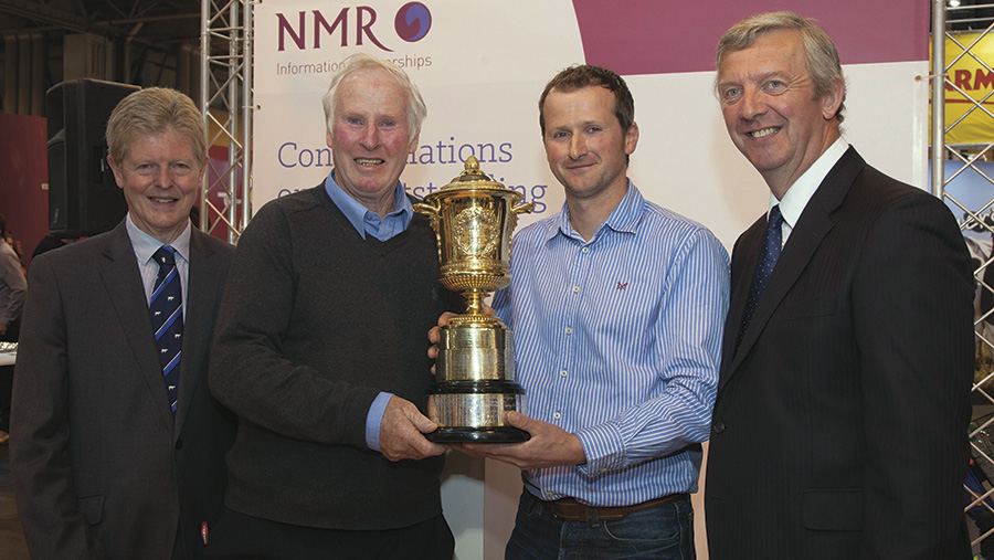 Gold Cup winner Simon Bugler (third from left) collects his trophy © Tim Scrivener