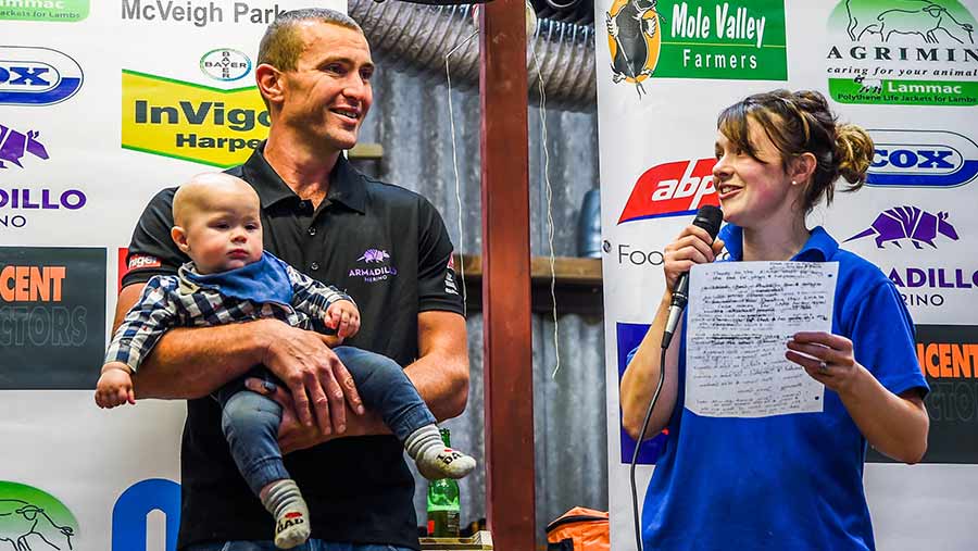 Matt and Pip Smith with their son Dusty after Matt set his world shearing record © Emily Fleur