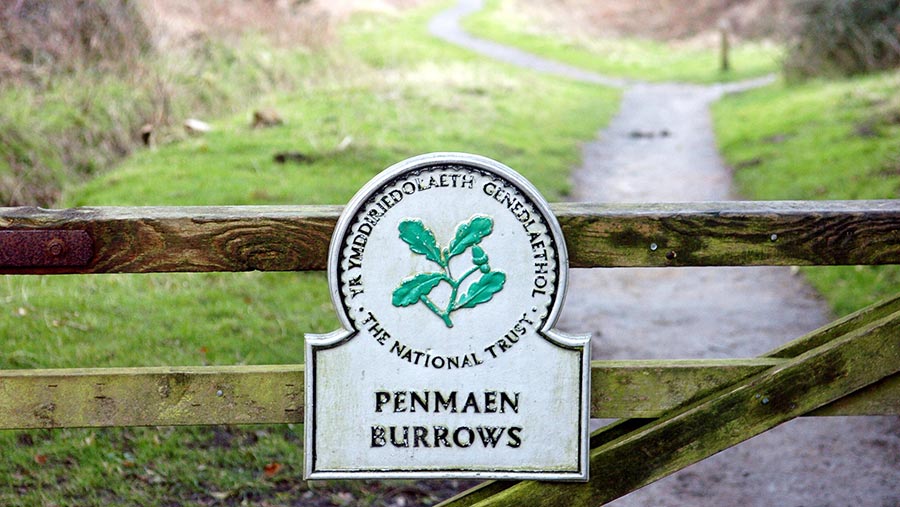 National Trust symbol at Penmaen Burrows, Gower Peninsula, Wales © REX/Shutterstock