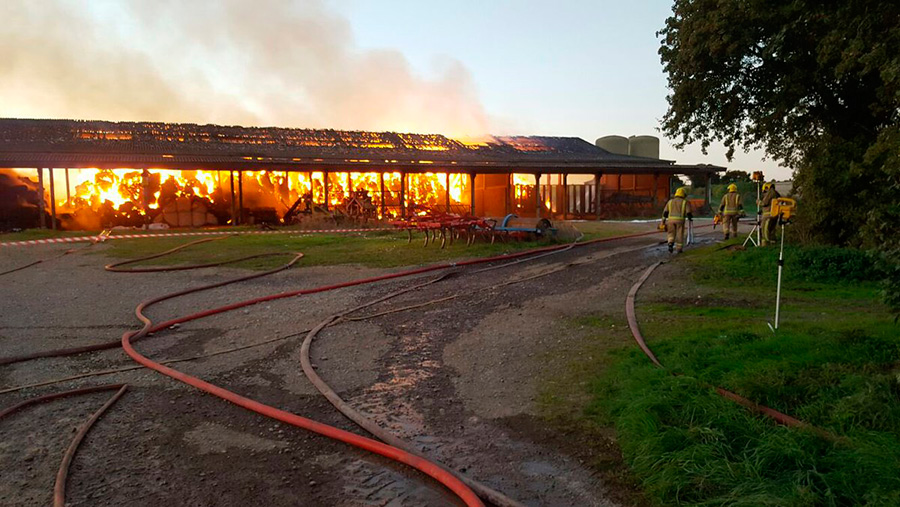 Fire crews battle huge barn blaze through the night Farmers Weekly