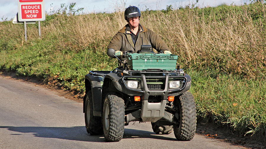 An all-terrain-vehicle being driven legally on the road