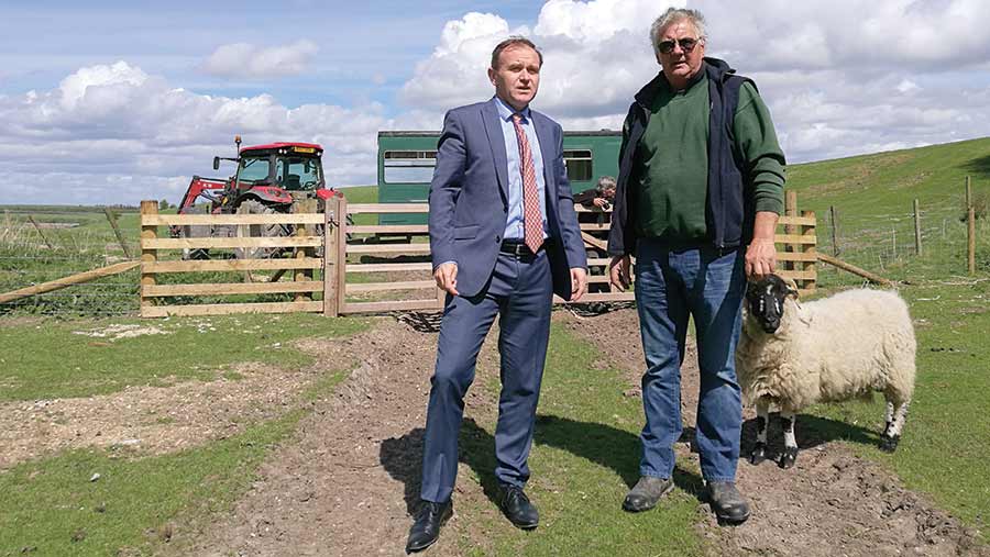 George Eustice with livestock farmer