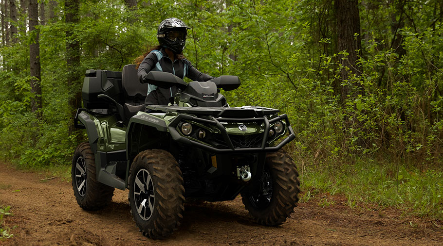 A rider drives a Can-Am Outlander Max Limited