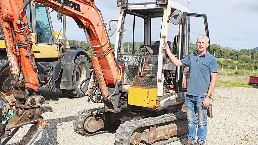 Inventor Cyril Patterson with his Kubota mini-digger