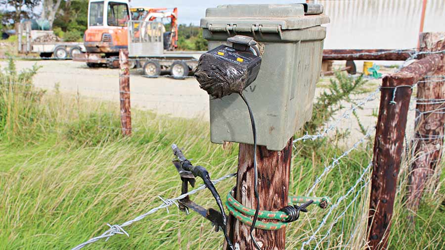 Home-built laser leveller sitting in a fence post