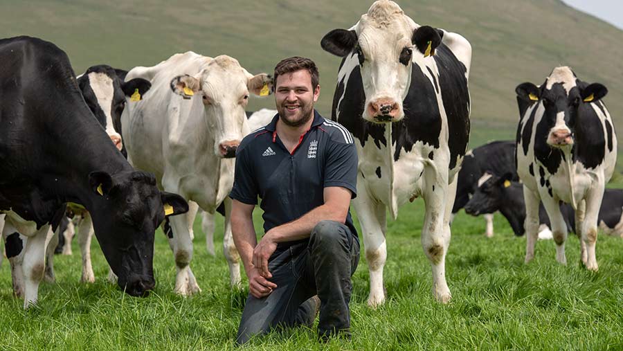 Farmer Patrick Morris-Eyton with Holstein cows