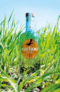 cuckoo gin bottle in field