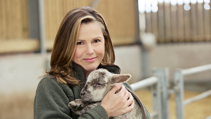 Liz holding a lamb
