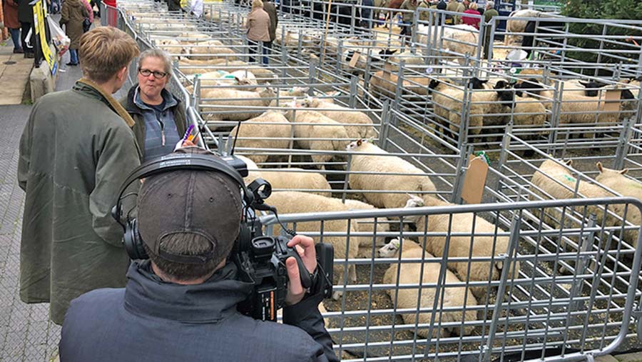 Rufus and Sarah Denne on camera © Oli Hill/RBI