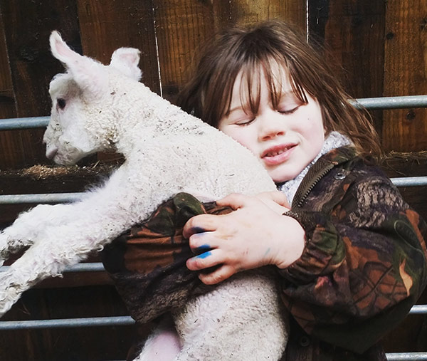 Girl with lamb