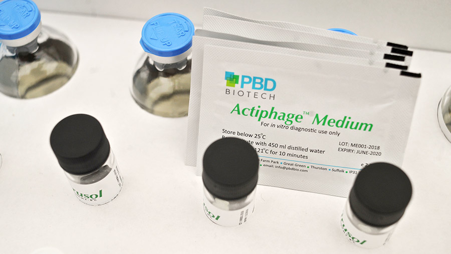 Glass vials and a packet labelled "actiphage medium"