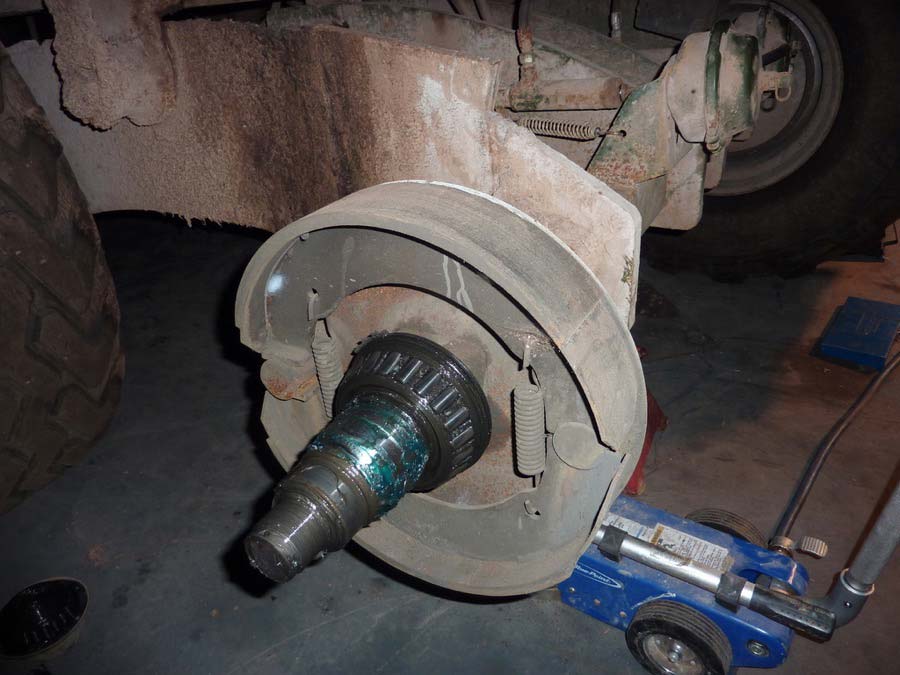 Axle with wheel bearing