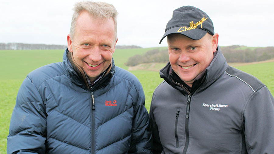 Agronomis and farmer in a field