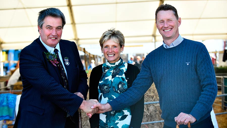 John Hamilton, left, presents the Sir William Young Award to Patsy and Ian Hunter at the 2018 RHS © RHASS