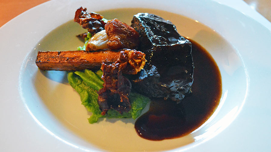 Melt-in-the-mouth braised beef with parsley mash and crispy bacon at Green Cow Kitchens © David Jones/RBI