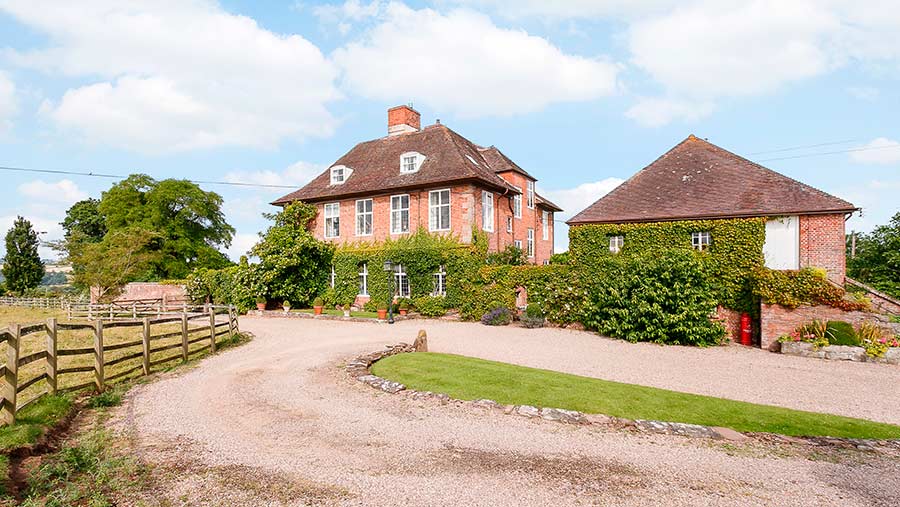 Farmhouse and driveway