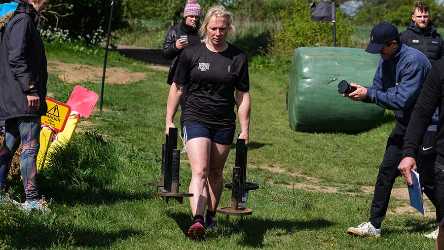 Fiona Penfold tackles the farmer's walk with the 2019 Britain's Fittest Farmer Final