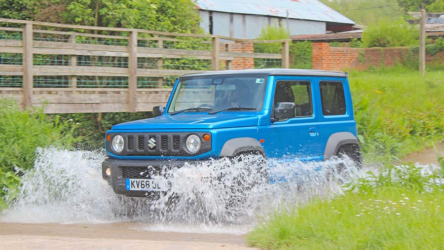Suzuki Jimny driving through water