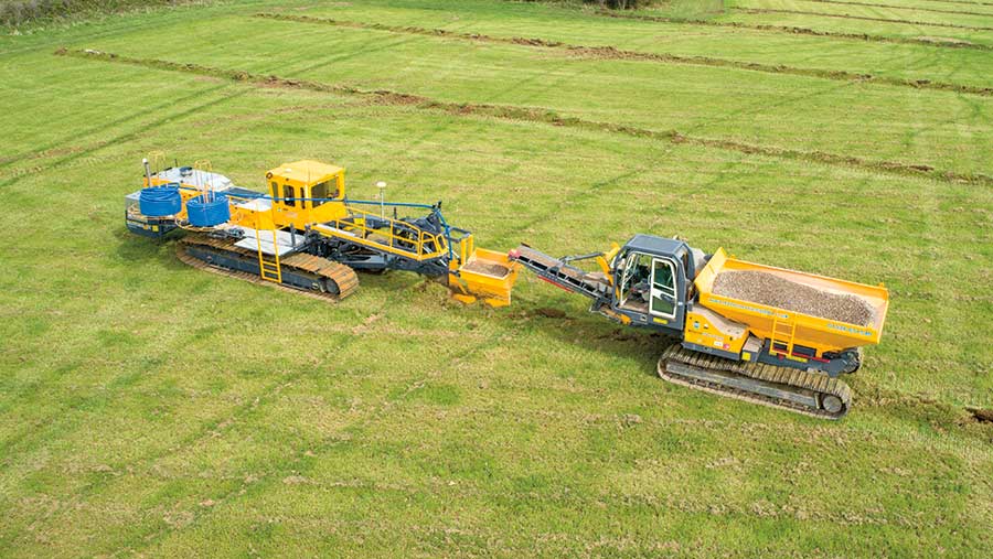 Plough and gravel cart seen from the air