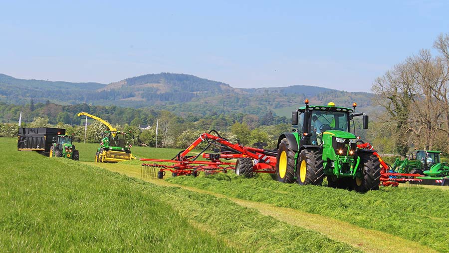 John Deere 6215R and KVGA13131 rake