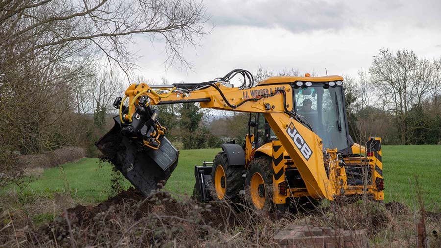 JCB digger with Tiltrotator attachment