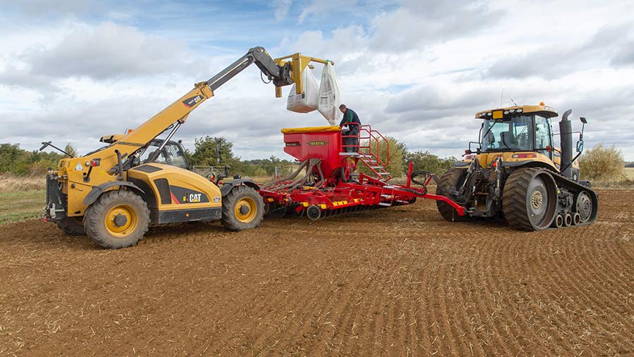 Filling seed drill with wheat