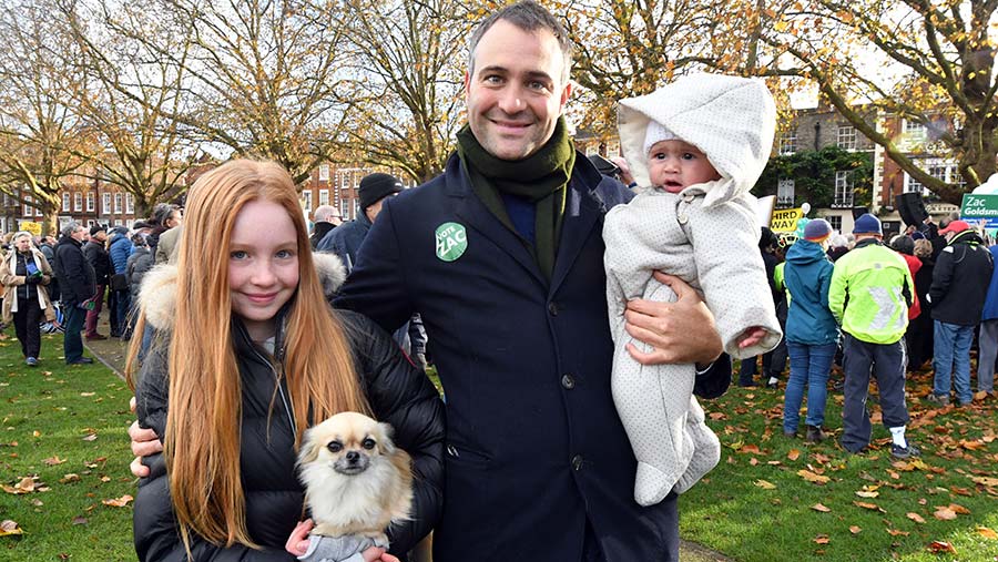 Ben Goldsmith with daughters Iris (left) and Eliza at a rally in November 2016 © Alan Davidson/Shutterstock