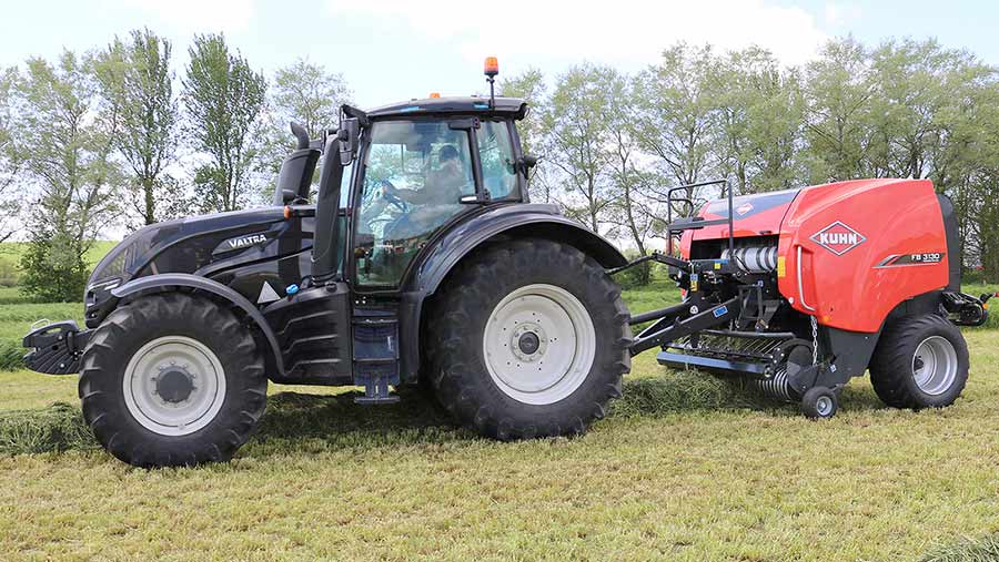 Kuhn FB baler and Valtra tractor 300