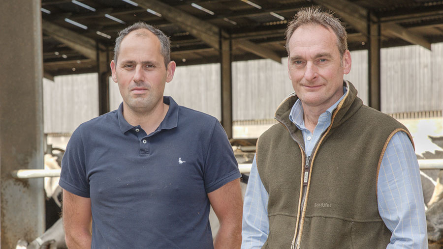 Bryn Moore(left) and Gavin Davies in cow shed