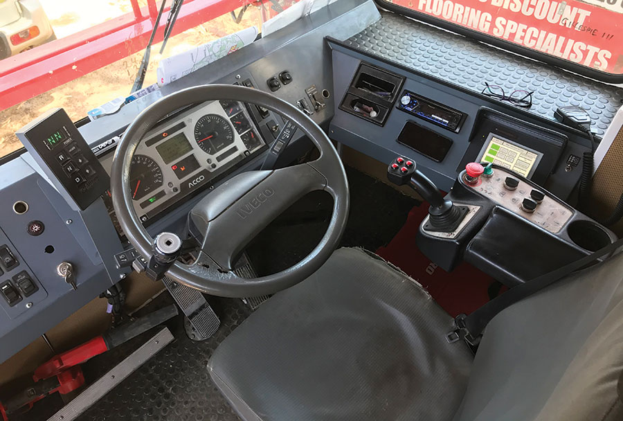 Inside bale chaser's cab