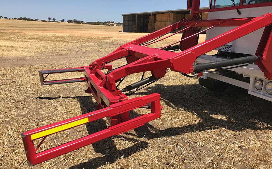 Front grab on bale chaser