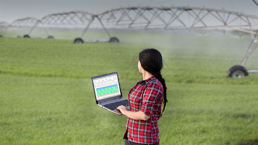 Farmworker using Sentek in field