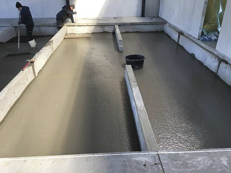 concrete laid on top of pipes