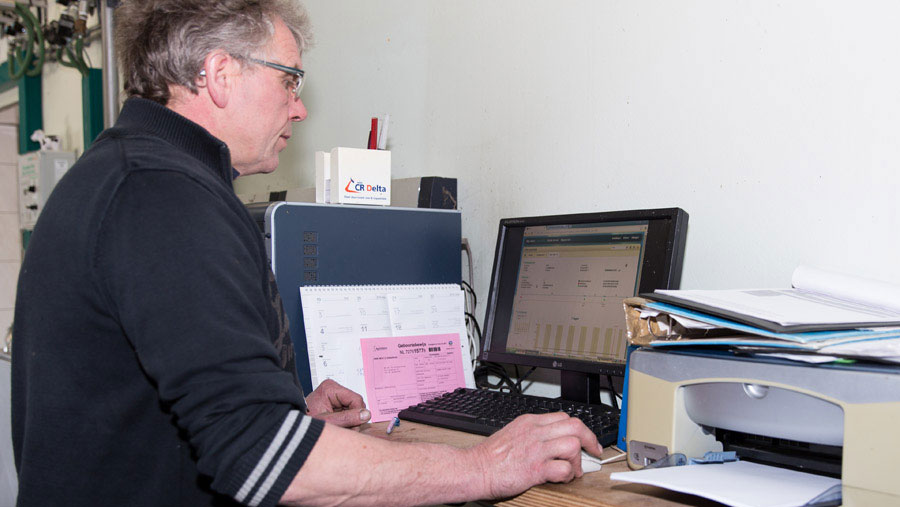 Mr Versteeg at his computer