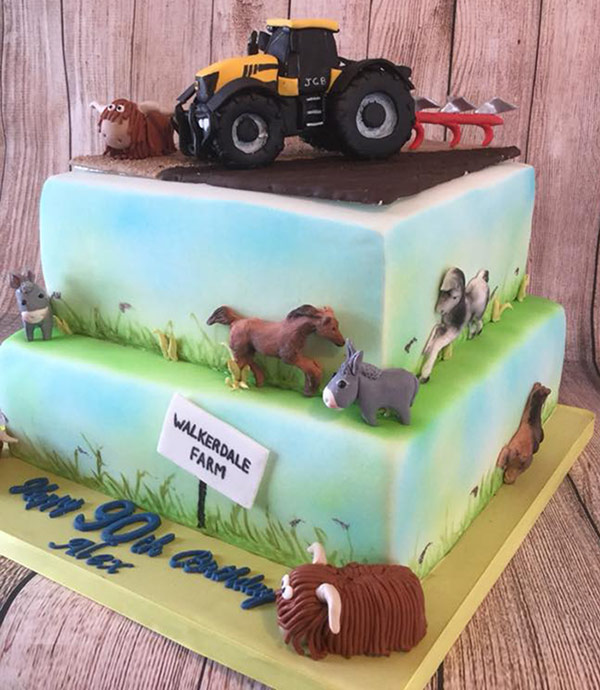 JCB cake with farm animals