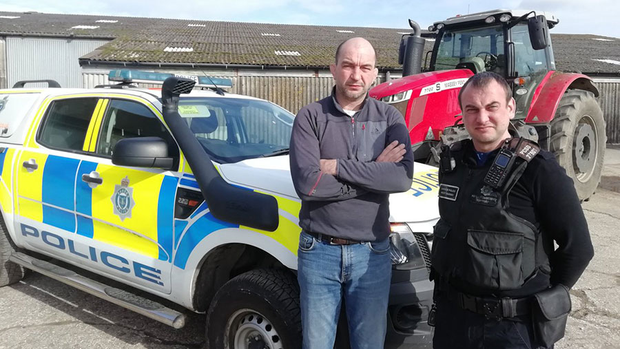 Farmer Mark Chandler and PCSO Colin Booker